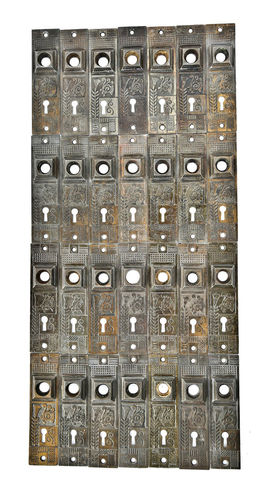 large lot of all original ornamental cast iron c. 1880's refinished salvaged chicago residential passage door backplates or escutcheons with a mostly uniform surface patina