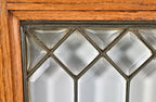 group of three all original and intact beveled edge "picket fence" pattern leaded glass chicago graystone two-flat cabinet doors with golden oak wood frames