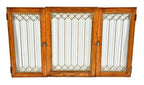 group of three all original and intact early 20th century antique american "picket fence" pattern leaded glass chicago graystone two-flat cabinet doors with golden oak wood frames