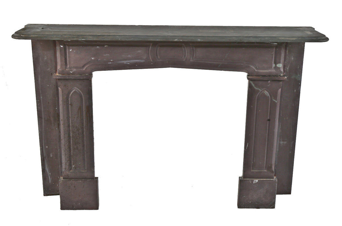 early 1870's gothic style american salvaged chicago refinished slate fireplace mantel with lightly incised design motifs and beveled edge shelf