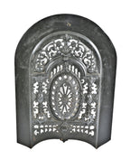 early 1870's ornamental cast iron salvaged chicago arch top interior residential fireplace perforated summer cover with a mostly uniform black enameled finish