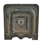 single 19th century ornamental cast iron salvaged chicago interior residential fireplace surround and matching summer cover with a mostly uniform black enameled finish