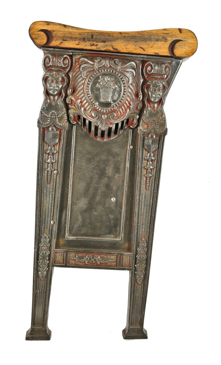 one of several matching original and intact brushed metal cast iron gethsemane missionary baptist church building figural theater seat ends with hardwood armrests