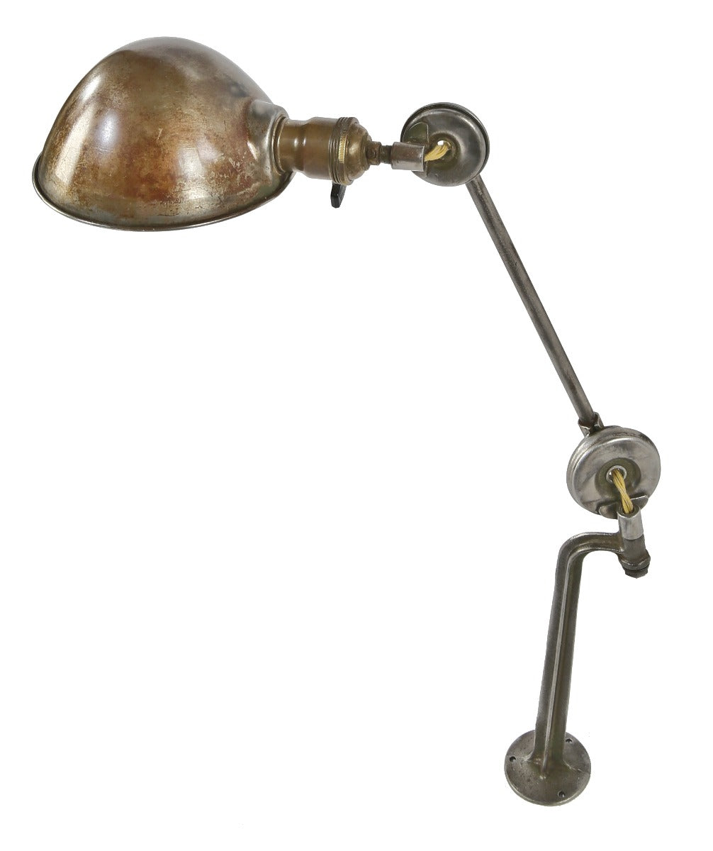 refinished late 1930's american industrial cast iron and tubular steel "adjusco" fully articulating disc-joint wall or workbench lamp