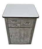 c.1940's refinished medical freestanding hospital examination room folded and pressed steel supply cabinet with intact "sani" white porcelain enameled tabletop