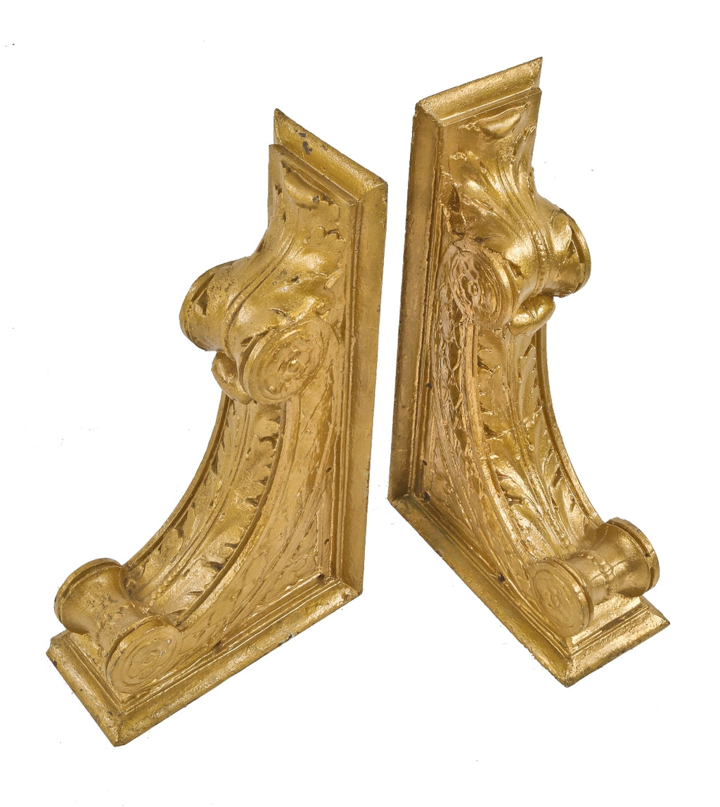 matching pair of c. 1920's original and intact interior chicago bank building neoclassical style ornamental cast iron corbels or brackets with metallic gold enameled finish