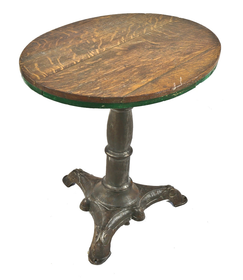 refinished late 19th century antique american stationary saloon table with brushed metal three-legged cast iron ornamental base and quarter-sawn oak wood top
