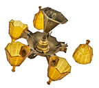 c. 1930's american depression era fully functional art deco style five-light slip shade interior residential ceiling fixture with uniquely shaped pressed amber glass shades
