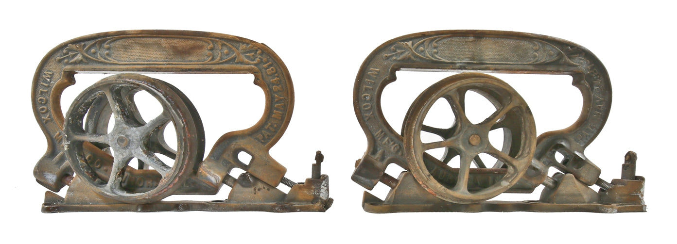 completely intact late 19th century hard to find original interior residential ornamental cast iron single pocket door brackets or hangers with rollers and base plates