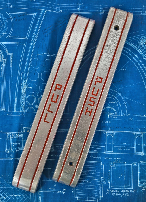 matching set of original streamlined style american depression era art deco cast aluminum movie theater "push" and "pull" entrance door handles