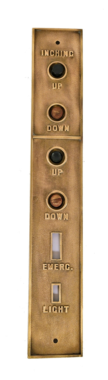 one of two matching original early 20th century oversized cast bronze oscar heineman silk factory building elevator cab push button plaques with largely uniform surface finish