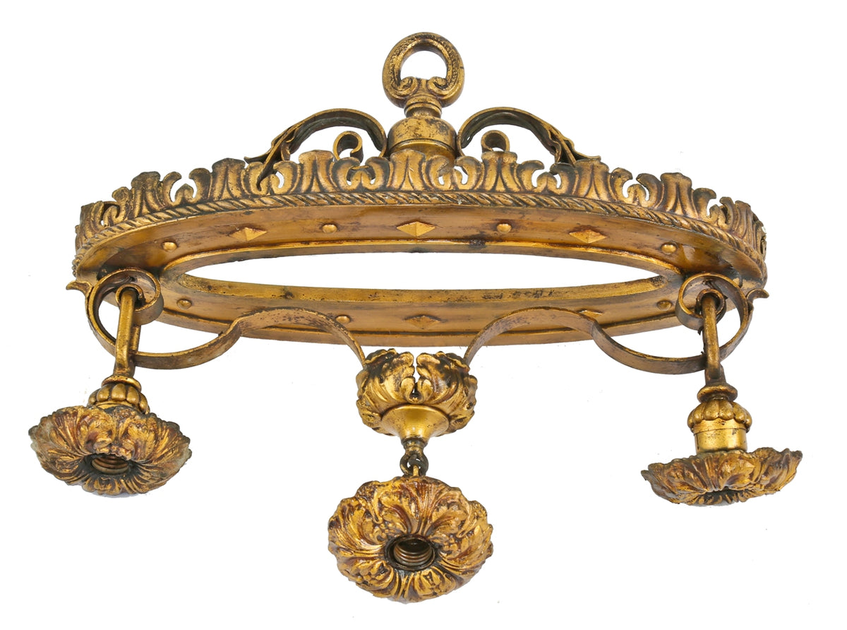 one of three matching oversized ornamental cast and wrought iron interior logan square masonic temple building hanging three-light fixture with original finish