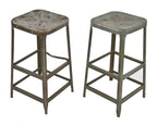 two matching c. 1950's gunship gray enameled salvaged chicago factory pressed and folded steel lyon stools with nicely aged patina
