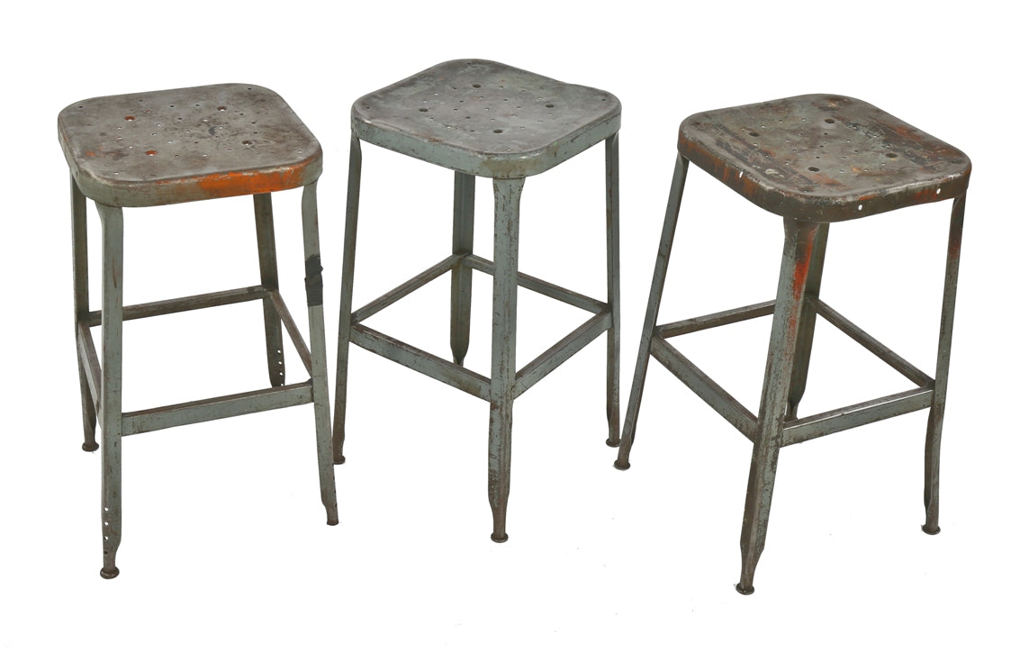 group of matching c. 1950's reinforced gunship gray enameled salvaged chicago factory pressed and folded steel lyon stools with nicely aged patina