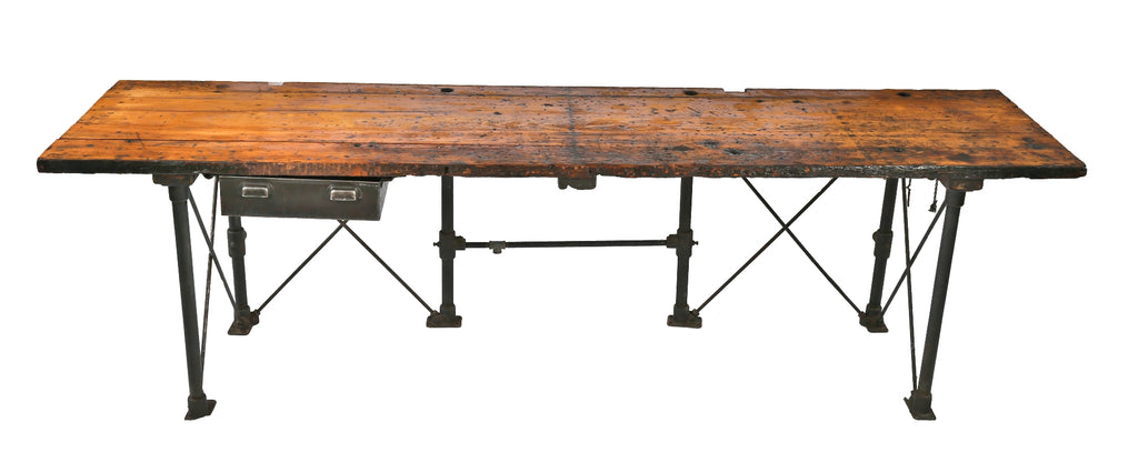 lightly refinished oversized 1930's depression era zim factory machine shop table or workbench with nicely weathered wood top and tubular cast iron bases