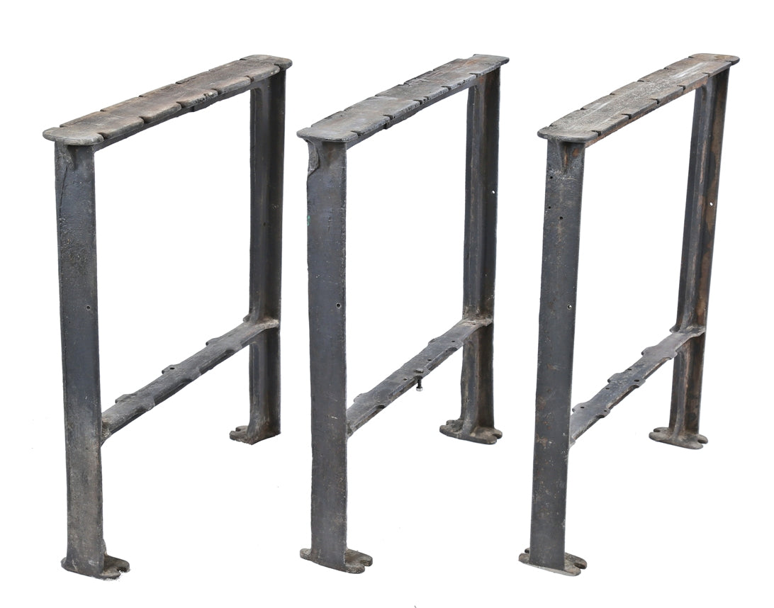 three matching original depression era antique american industrial cast iron chicago factory workbench table bases or legs with outswept feet