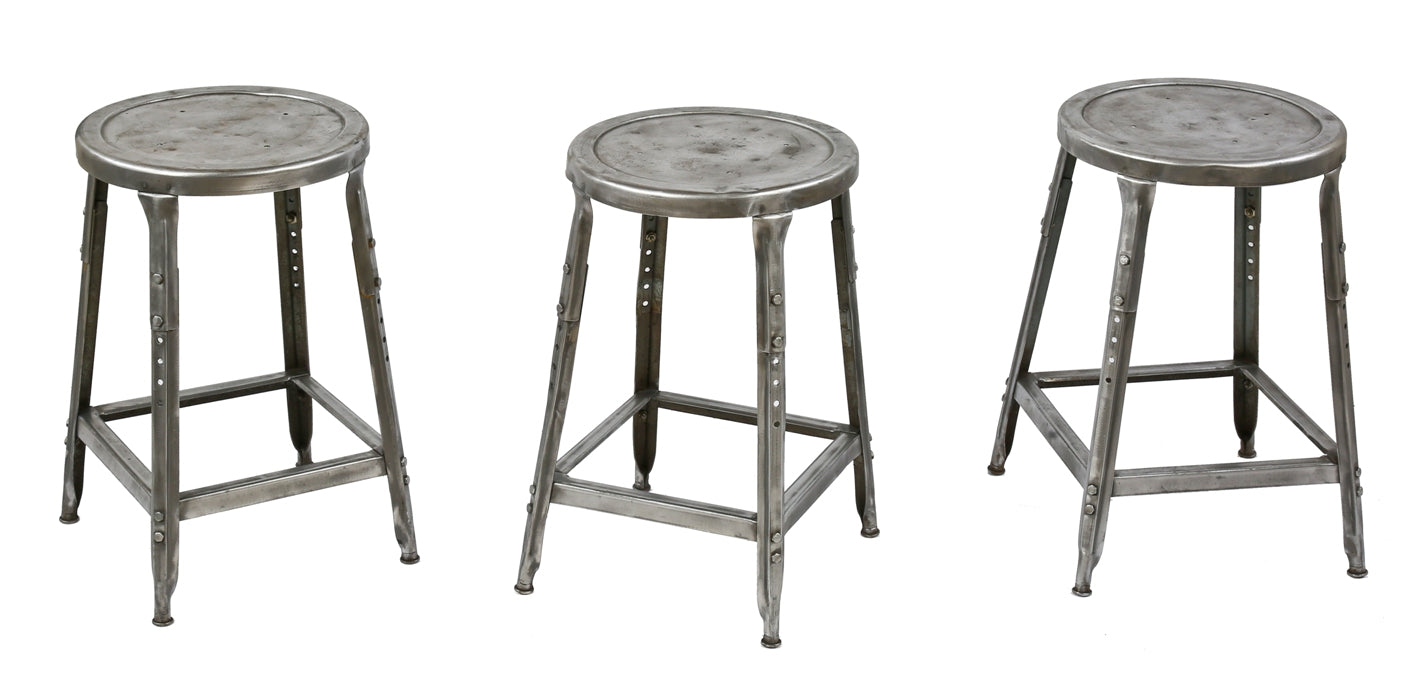 group of three matching refinished brushed metal c. 1950's salvaged chicago adjustable height factory pressed and folded steel lyon stools with clear coat finish