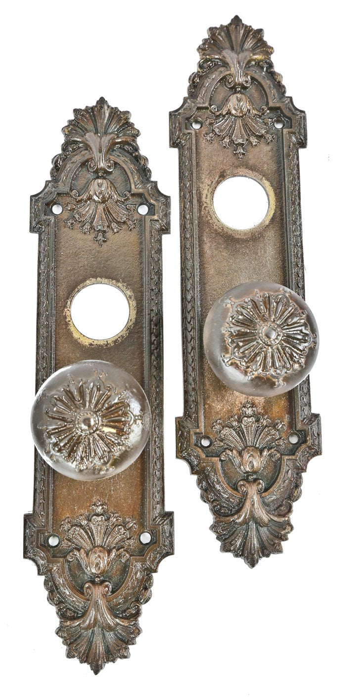 original early 20th century ornamental cast iron "ontario" pattern salvaged chicago entrance door knobs and matching oversized backplates or escutcheons