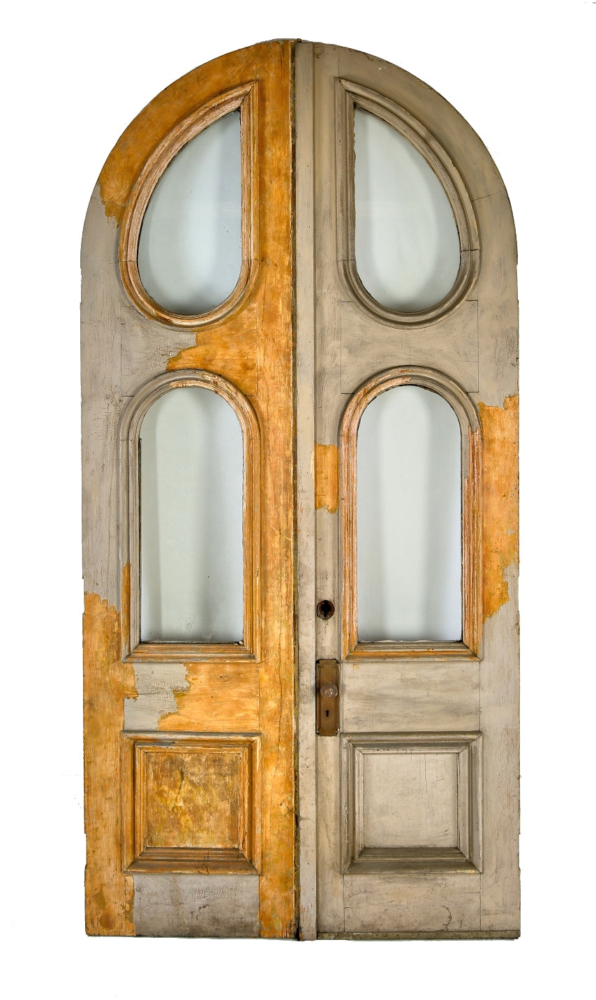 exceptional early 1870's all original oversized residential vestibule arch top entrance doors with built up molding and inverted "tear drop" glass panels