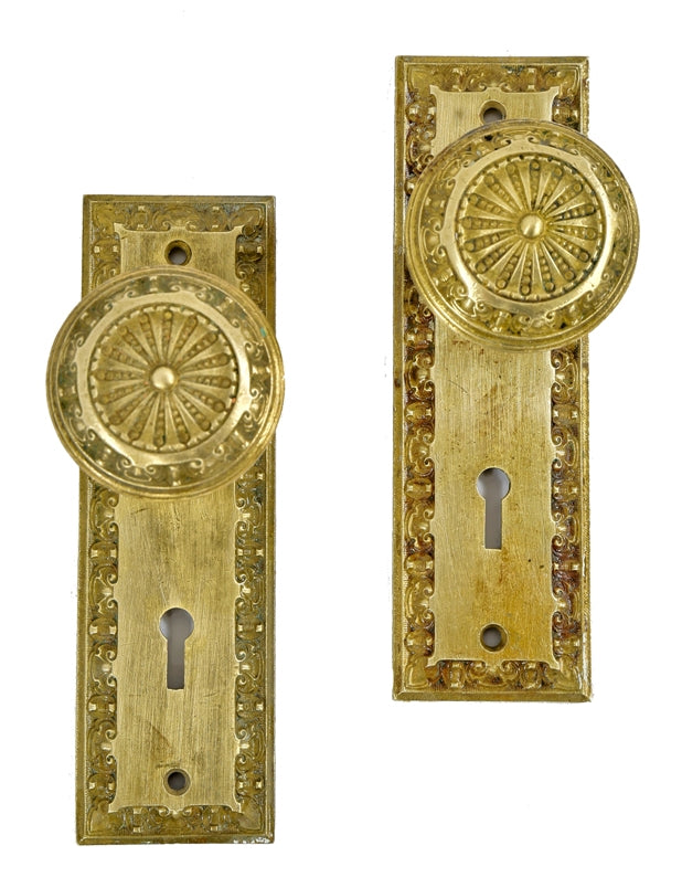 matching set of original cast brass salvaged chicago "nassua" pattern interior residential doorknob back plates and handles
