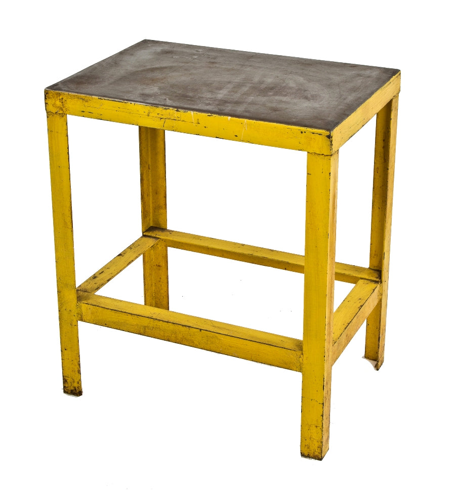 original four-legged welded joint angled steel american factory machine shop stationary table with old yellow painted finish