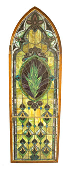 massive late 19th or early 20th century original richly colored chicago gothic style stained glass window featuring a centrally located plant form