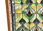 massive late 19th or early 20th century original richly colored chicago gothic style stained glass window featuring a centrally located plant form