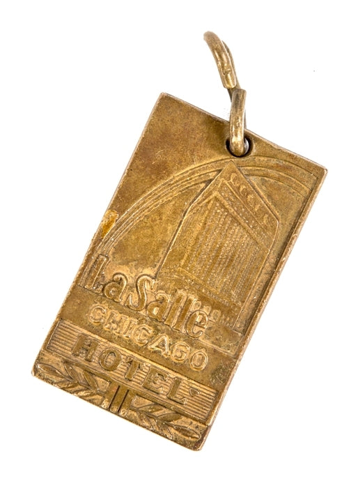 original double-sided american depression era chicago lasalle hotel key fob with nicely aged surface patina