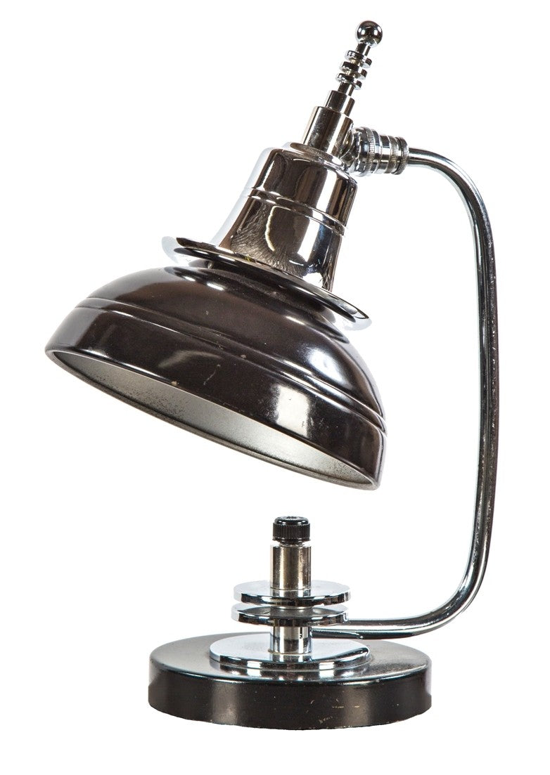 refinished highly sought after 1930's art deco machine age polished chrome and black enameled table lamp with distinctive speed rings