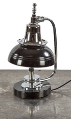 refinished highly sought after 1930's art deco machine age polished chrome and black enameled table lamp with distinctive speed rings