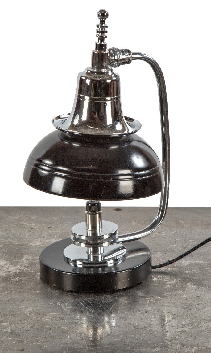 refinished highly sought after 1930's art deco machine age polished chrome and black enameled table lamp with distinctive speed rings