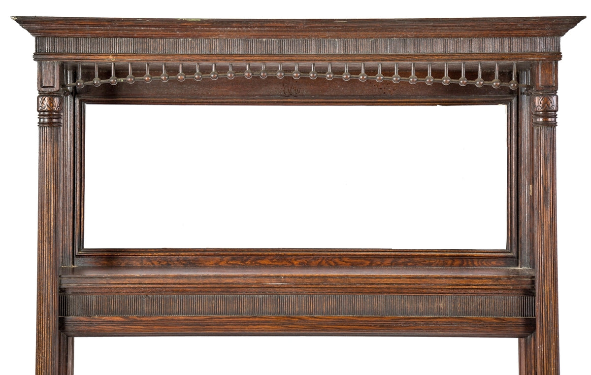 oversized all original 19th century varnished oak wood salvaged chicago antique american victorian era fireplace mantel with solid fluted posts and intact beveled edge mirror