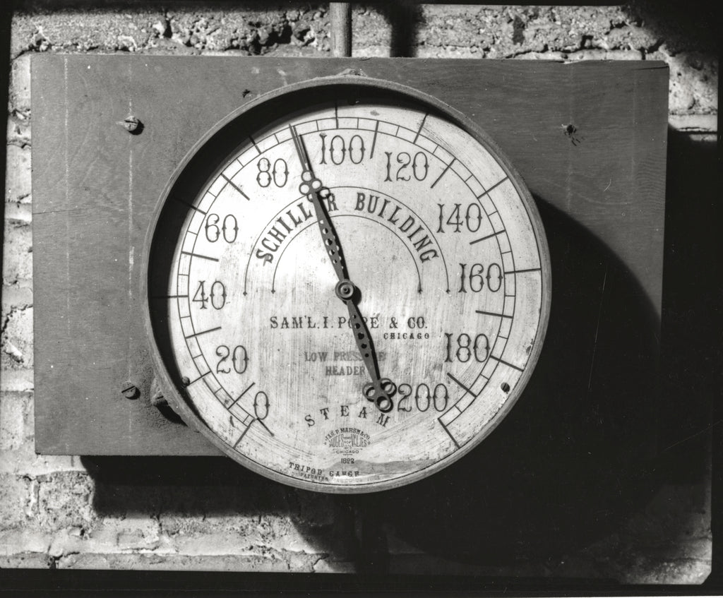 original oversized cast brass encased steam pressure gauge salvaged from holabird and roche's pontiac building abandoned basement heating plant dating to 1890
