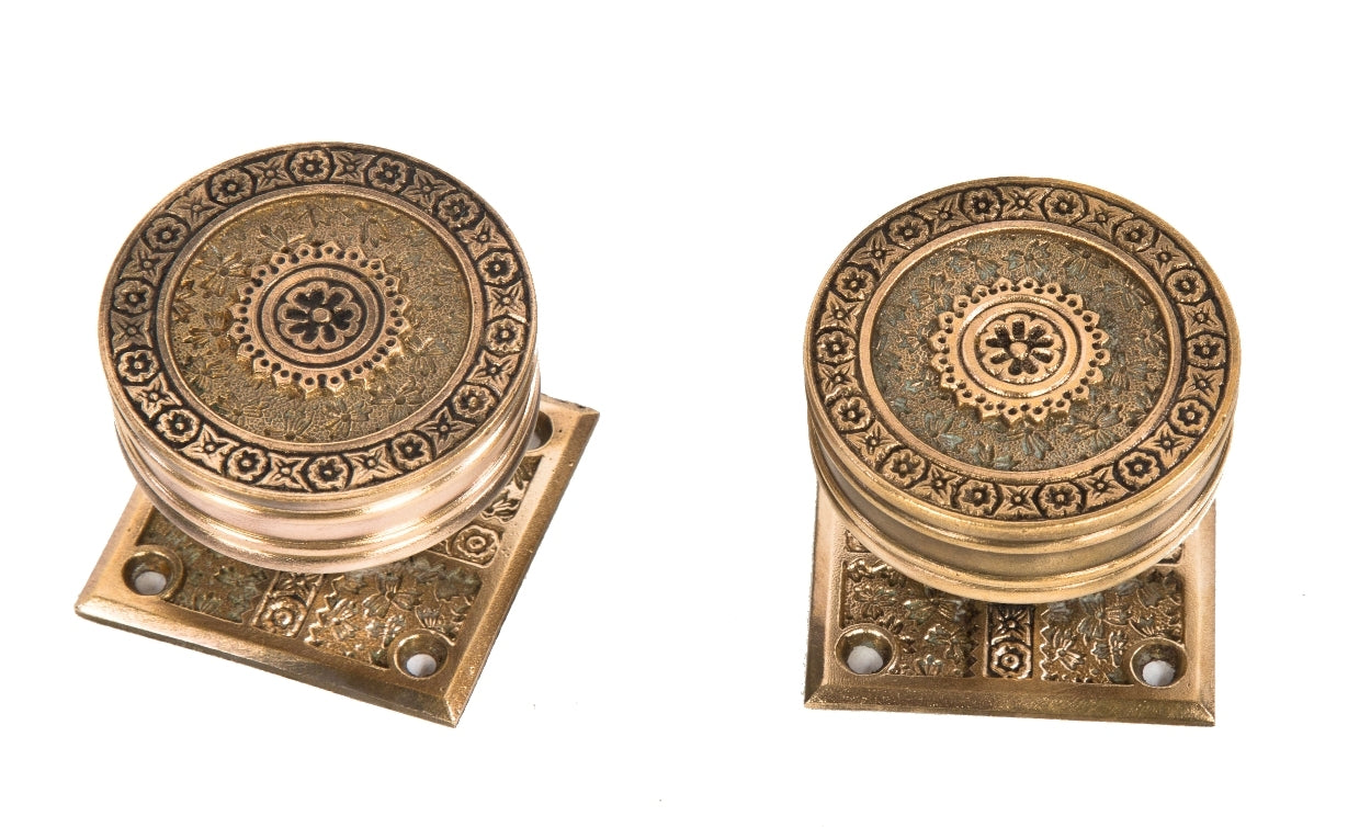 matching set of hard to find 1880's antique american eastlake style ornamental cast bronze "ivy" pattern drum-shaped doorknobs and matching oversized rosettes