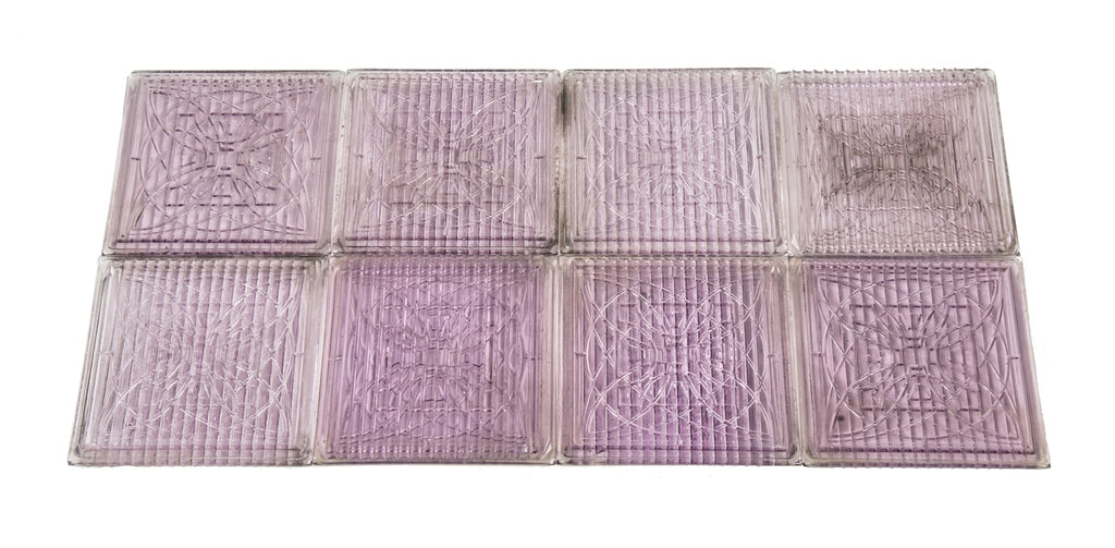 original and remarkably intact c. 1900's frank lloyd wright-designed "sun-purple" exterior building facade transom panel ornamental luxfer tiles