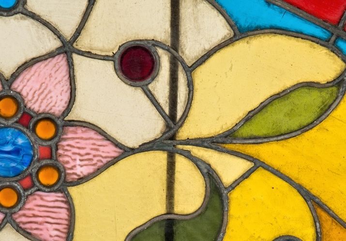 19th century original salvaged chicago oversized richly colored archtop stained glass window bedecked with jewels