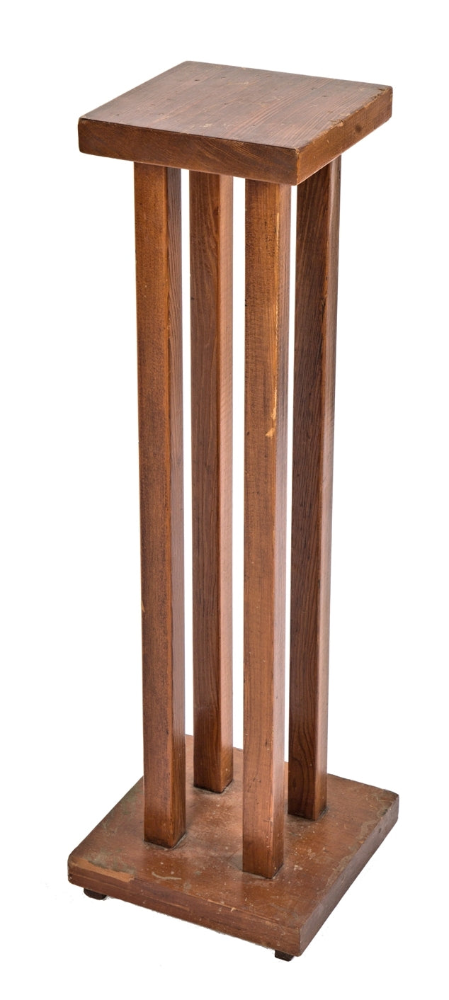 original and intact early 20th century freestanding prairie style varnished wood display pedestal supported by four square-shaped posts