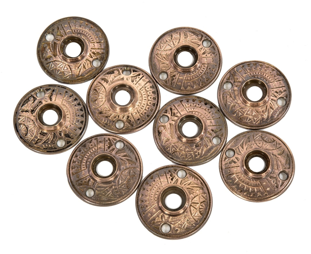 group of original 1880's highly desirable ornamental cast bronze "oriental" pattern interior residential salvaged chicago eastlake style passage door rosettes with nicely aged patina