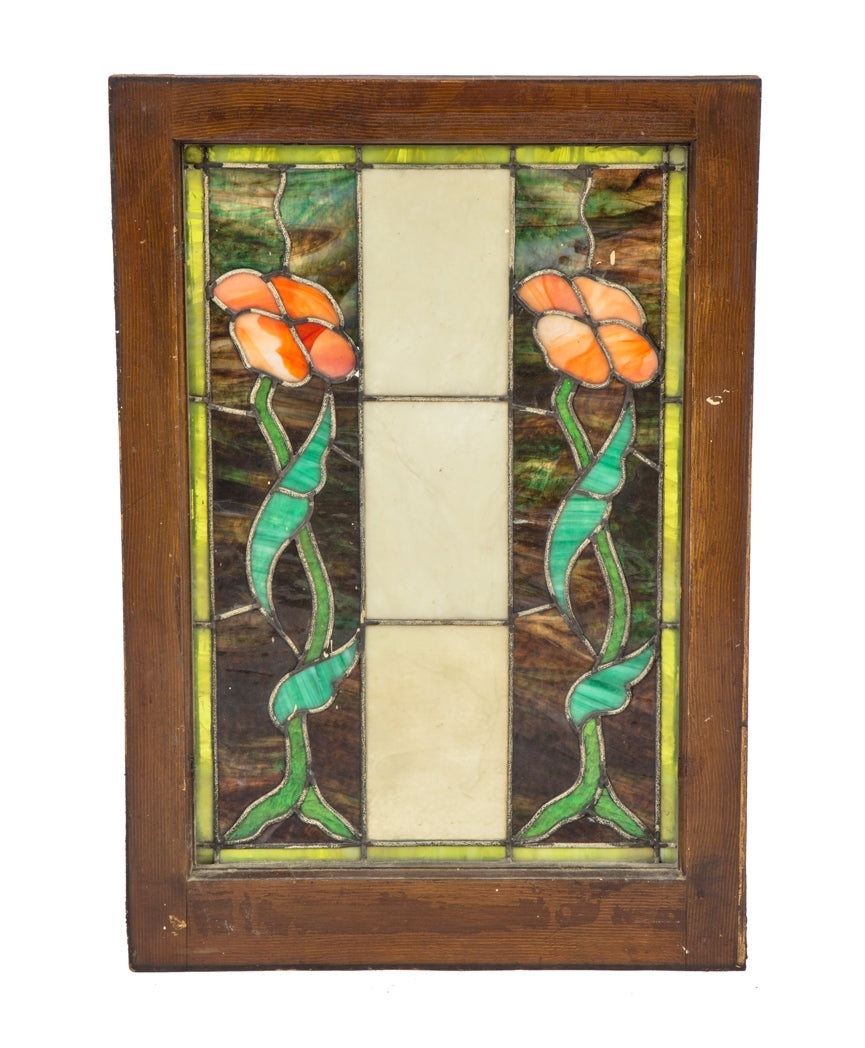 marvelous early 20th century finely executed american art nouveau leaded art glass interior residential window featuring two richly colored flowers withe leafage
