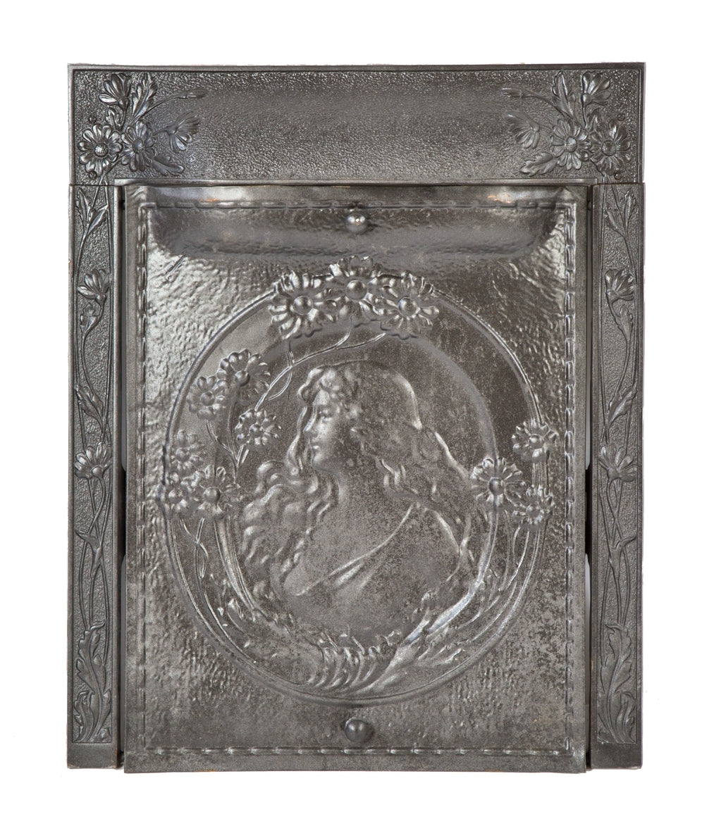 original late 19th or early 20th century cast iron and steel american victorian era interior residential fireplace mantel summer cover and matching surround