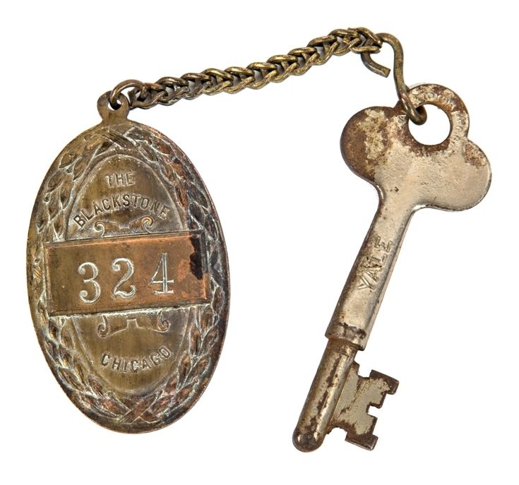 early 20th century original salvaged chicago blackstone hotel ornamental cast bronze guest room key fob with nickel-plated skeleton key
