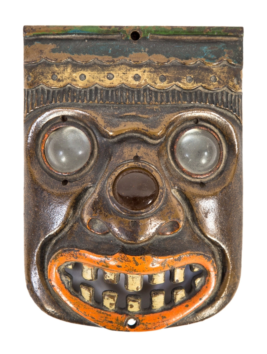 rare c. 1928 historically impotant polychrome enameled fisher theater cast iron seat end mayan revival "indian mask" with jeweled eyes and nose