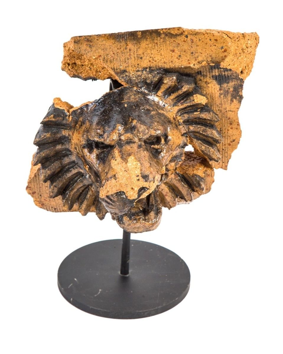 henry schlacks-designed speckled glazed salvaged terra cotta st. bonafice school lionhead fragment
