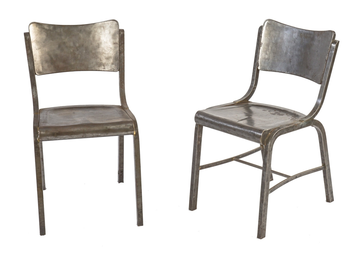 matching set of original c. 1930's american depression-era pressed and folded steel four-legged unique shaped chairs with saddle seats and contoured backrests