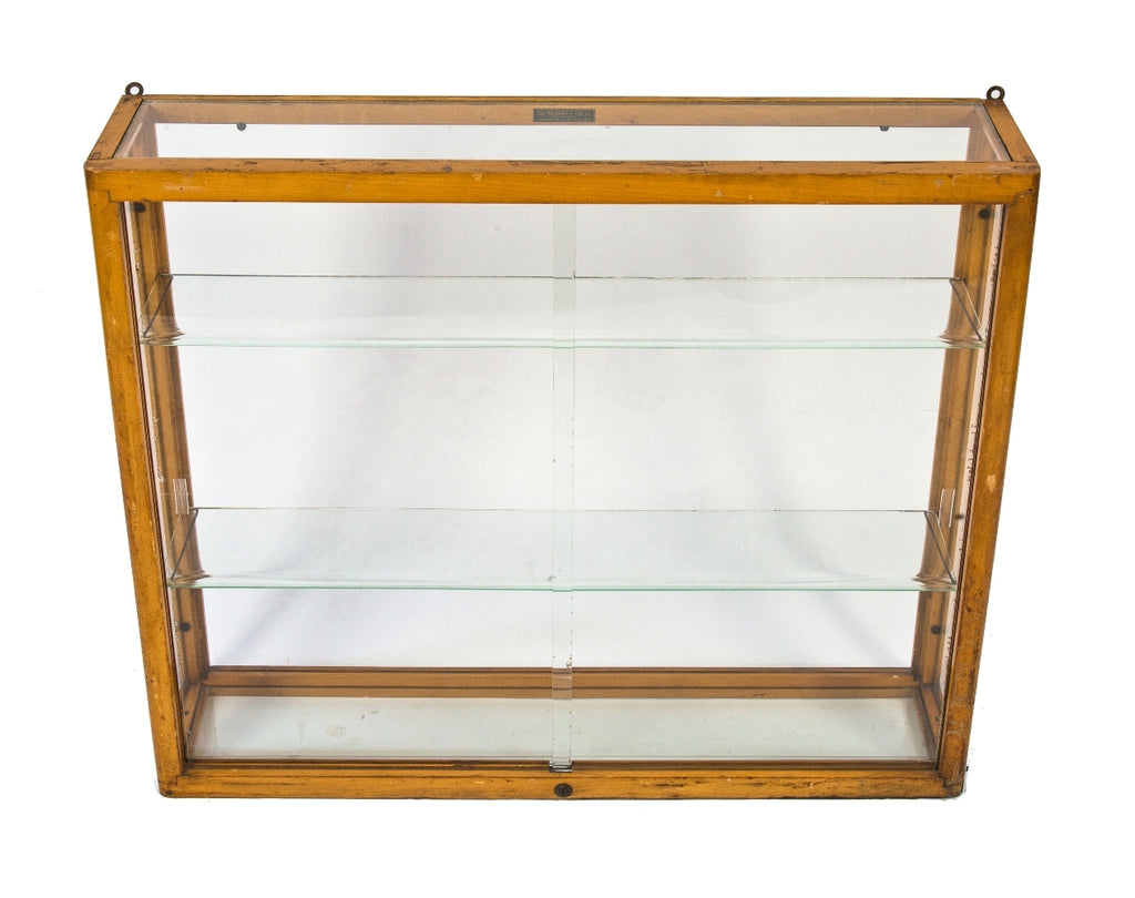 original and intact wall-mount early 1930's american depression-era waddell varnished maple wood compact display case with plate glass sliding doors and adjustable shelves
