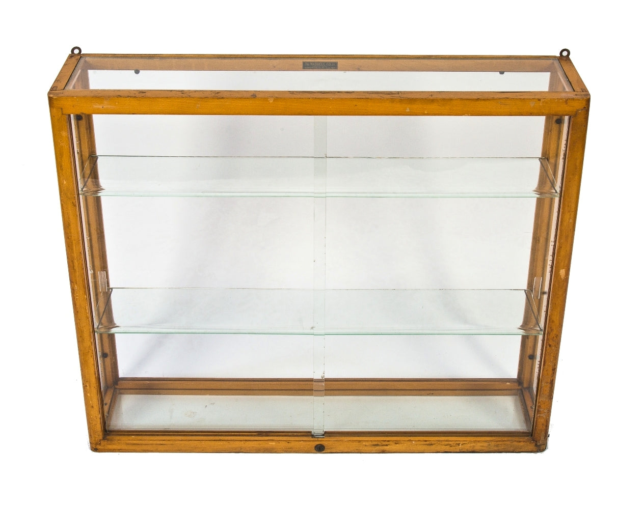 original and intact wall-mount early 1930's american depression-era waddell varnished maple wood compact display case with plate glass sliding doors and adjustable shelves