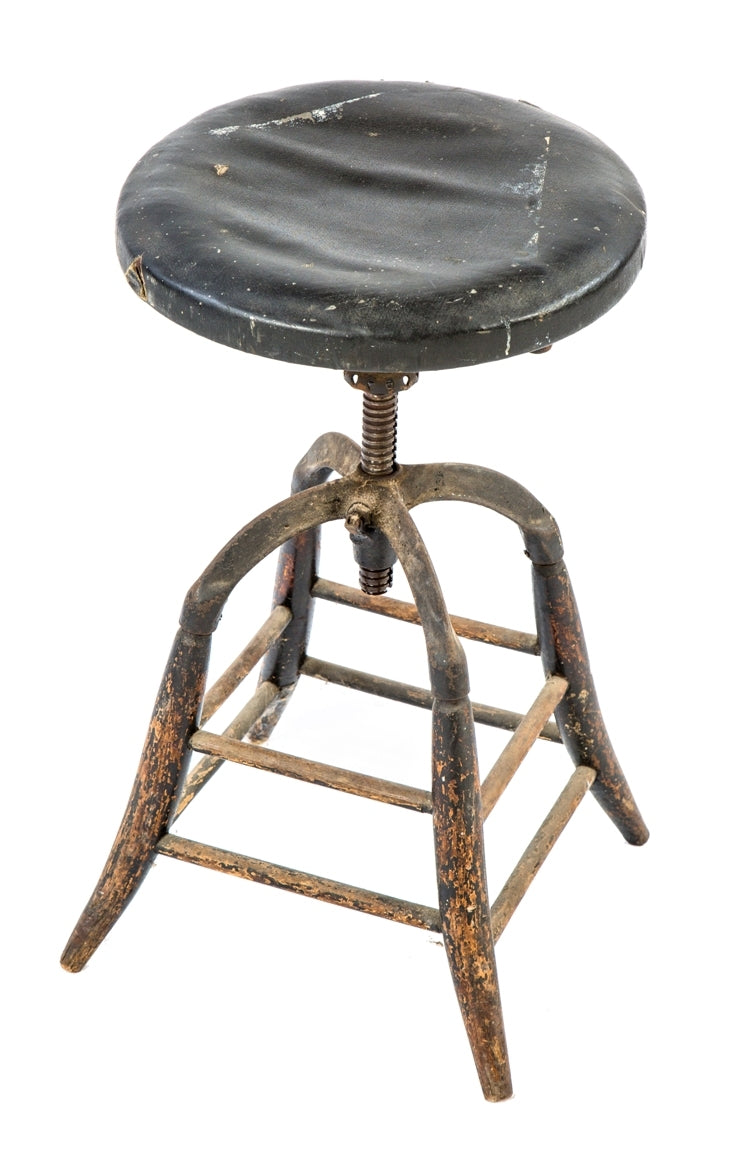 early 20th century original and fully functional adjustable height dietzgen drafting stool with amazingly intact black leather cushioned seat and tapered legs