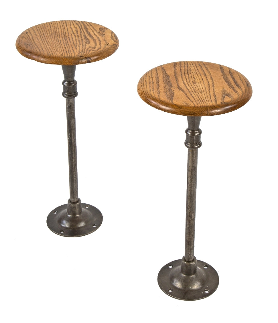 two original freestanding antique american matching drake hotel soda fountain swivel seat stools with intact oak wood seats and brushed cast iron pedestal bases