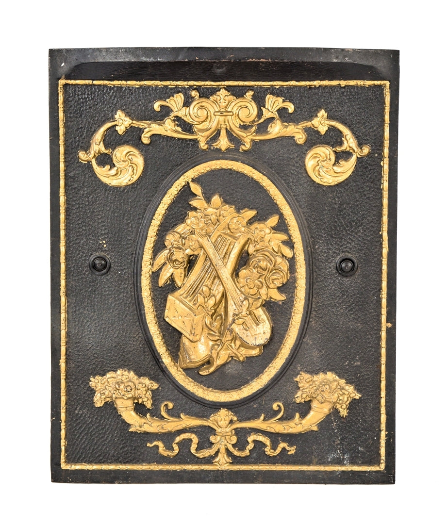 c. 1890's american victorian era st. louis rowhouse ornamental cast iron interior residential fireplace summer cover with unique assemblage of musical instruments