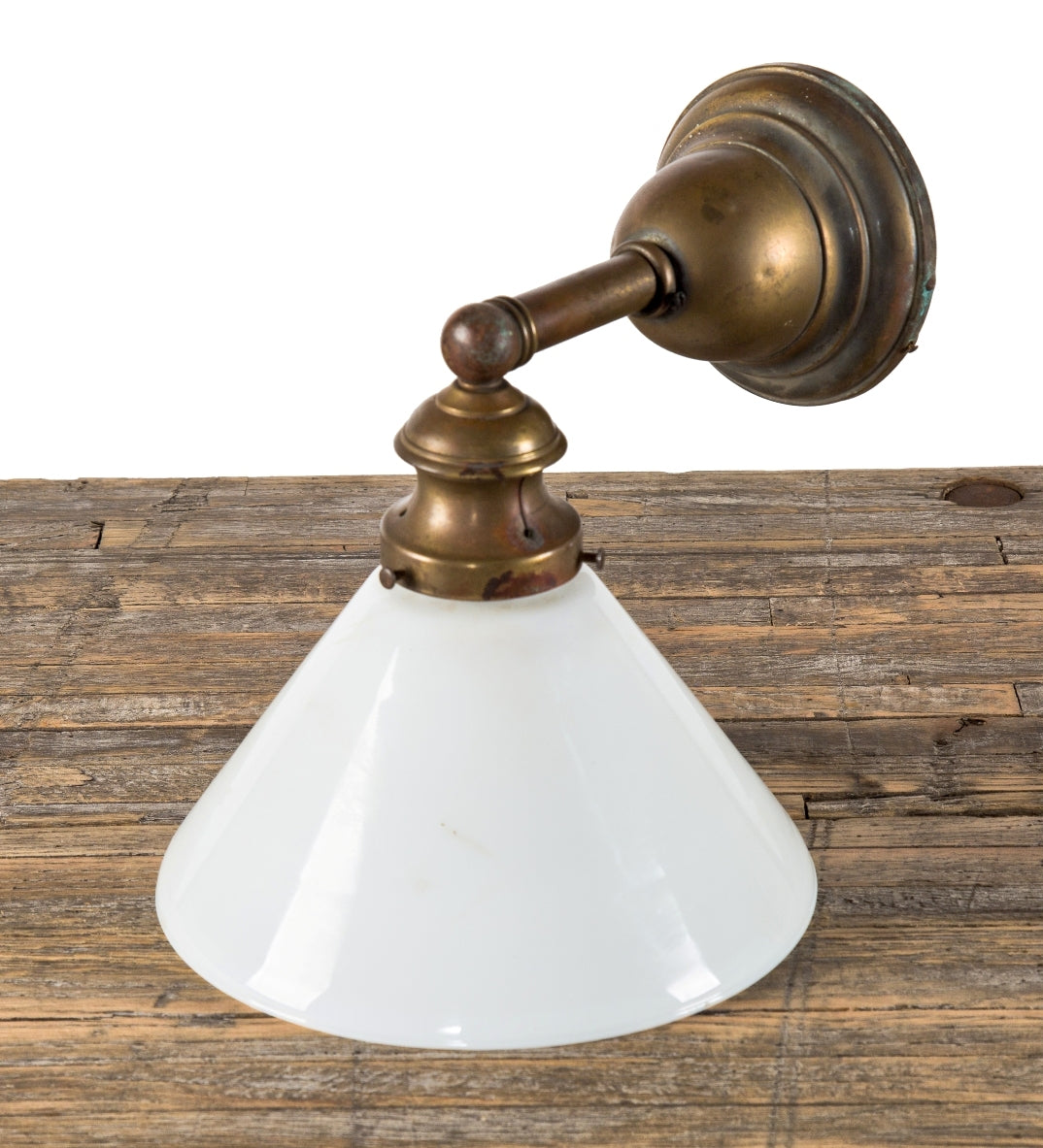 single early 20th century simple and elegant nicely aged brass residential or commercial wall sconce with intact white glass shade or reflector